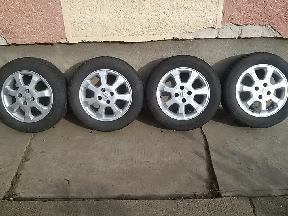 4 db gyári opel 15-ös alufelni ,semperit speed life 195 60 r15-ös nyári gumival eladó!