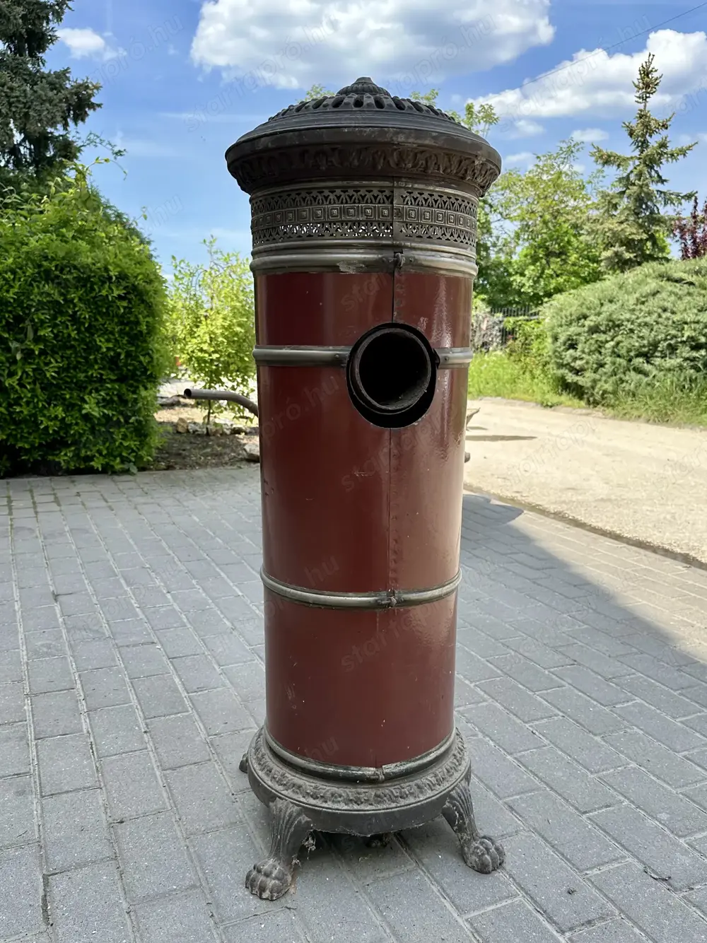 Eladó egy ritka, Monarch Patent típusú antik hengerkályha.