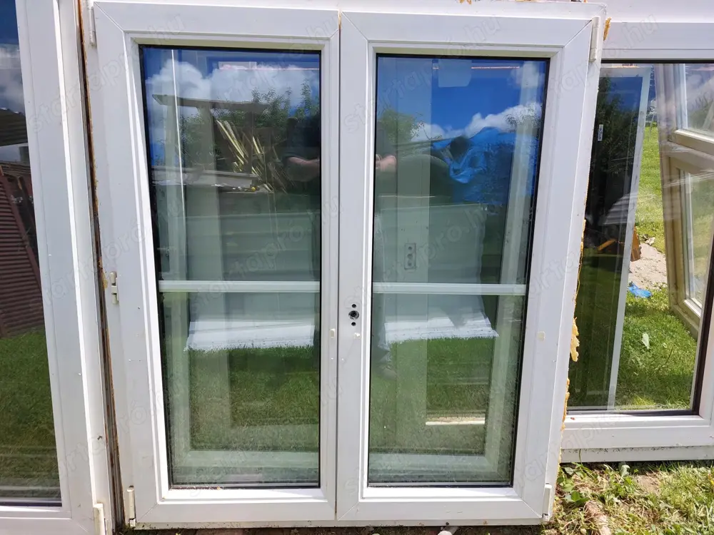 Műanyag 2 szárnyú bukó-nylló 2 réteg hőszigetelt üveg sz;108  m;125 cm tok osztó nélküli kép szerint