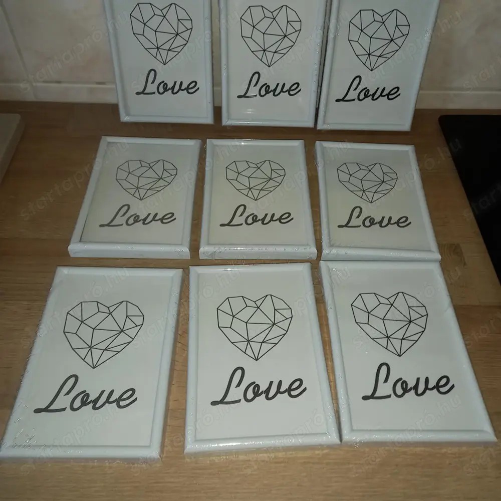 9 db. 10x15 cm-es fehér képkeret eladó, ÚJ!