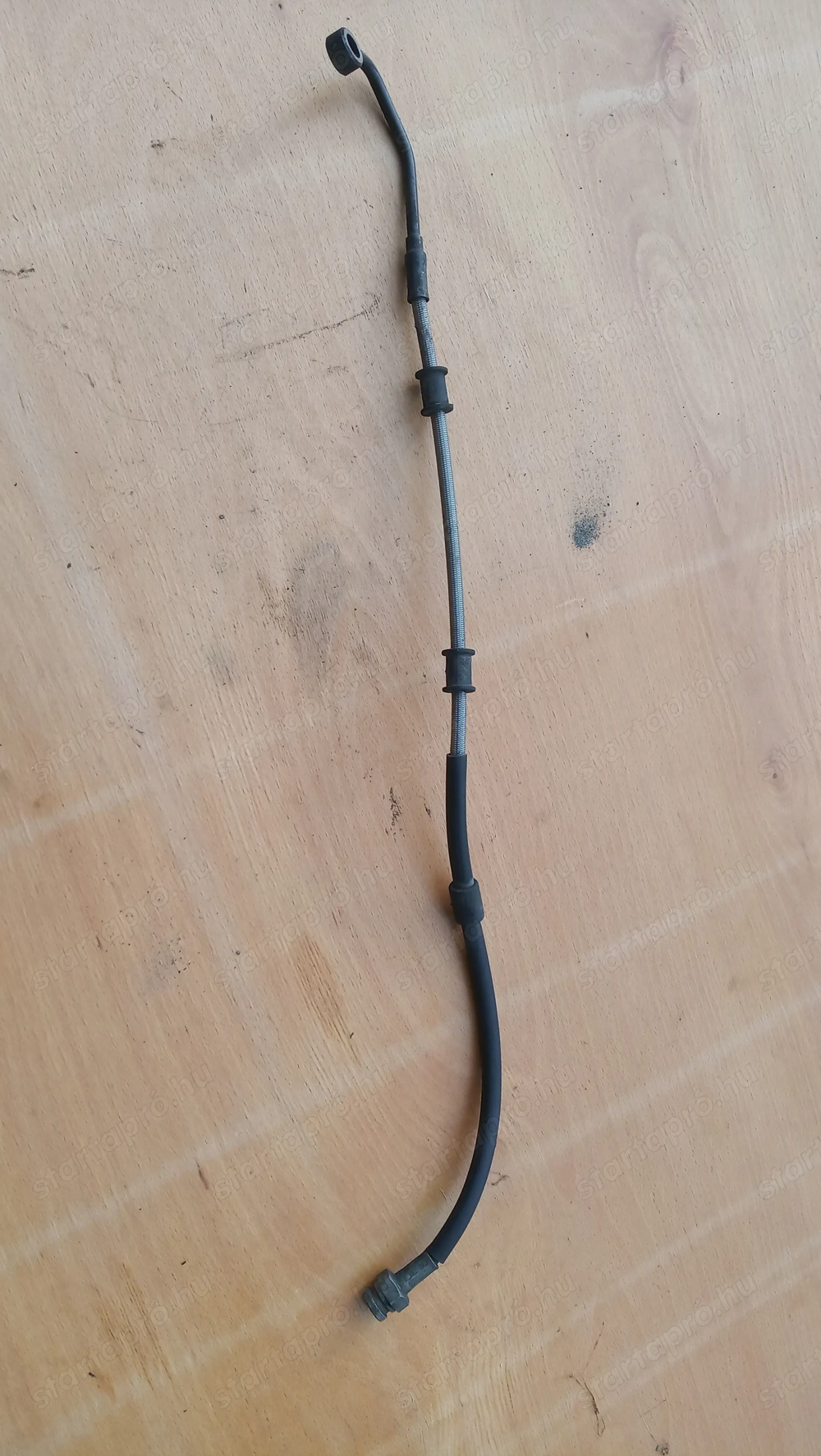 Piaggio Xevo 400 hátsó fékcső