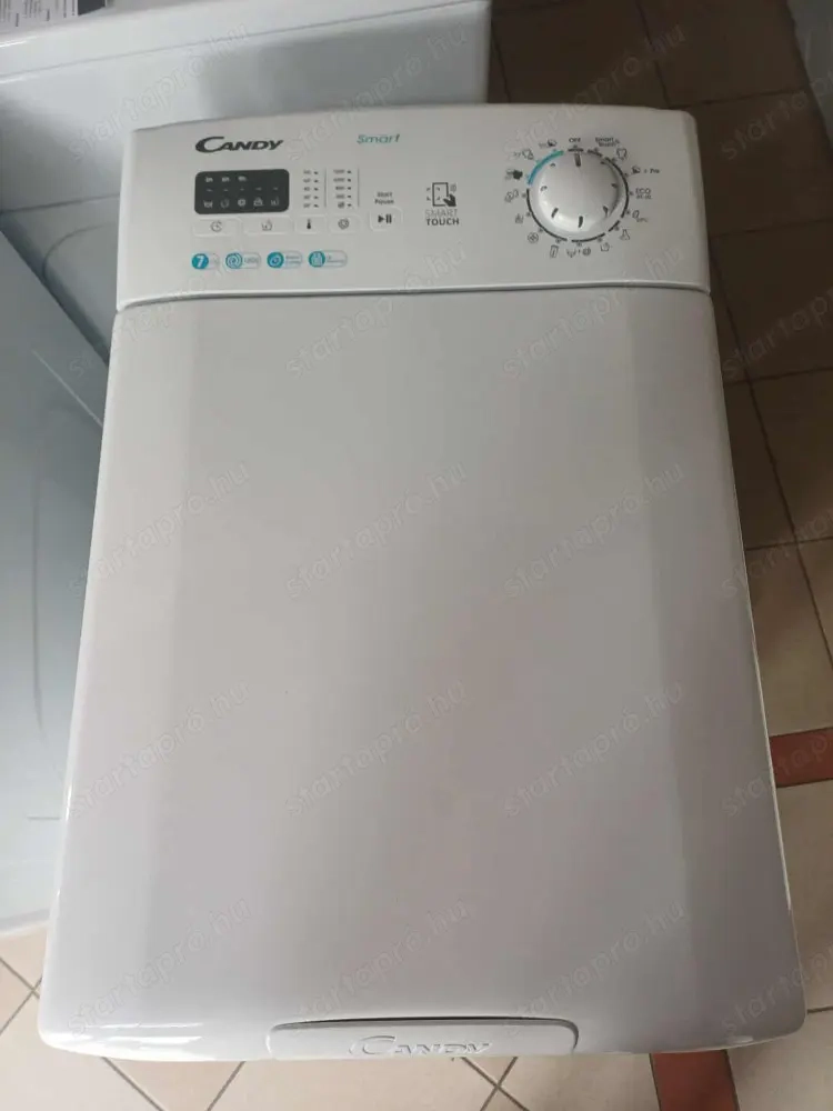 Sérült Új Candy CST27LET 1-S Felültöltős Mosógép [O373] 6 hónap garanciával