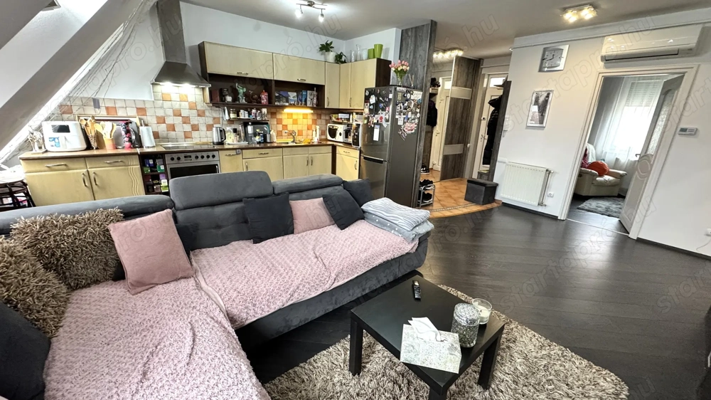 Ér utcán 61 nm-es 2 szoba-amerikai konyha-nappalis erkélyes fiatal tégla építésű lakás eladó.