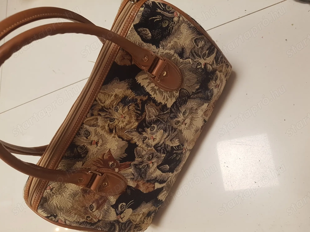 Kézitáska  cicás motivumokkal butorszövet bevonattal, erős, stabil, vadonat uj, ajándékba kapott.