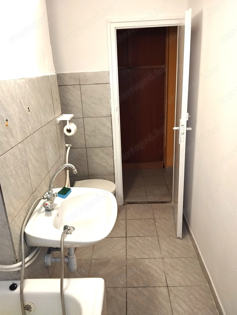 Belvároshoz közel 1 szobás téglalakás