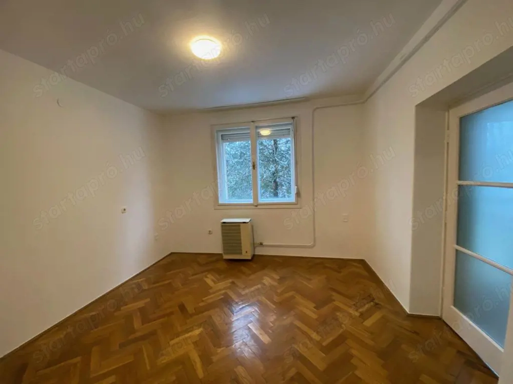 Kiadó erkélyes, 2 szobás lakás a XI. kerületben, udvari beállóval