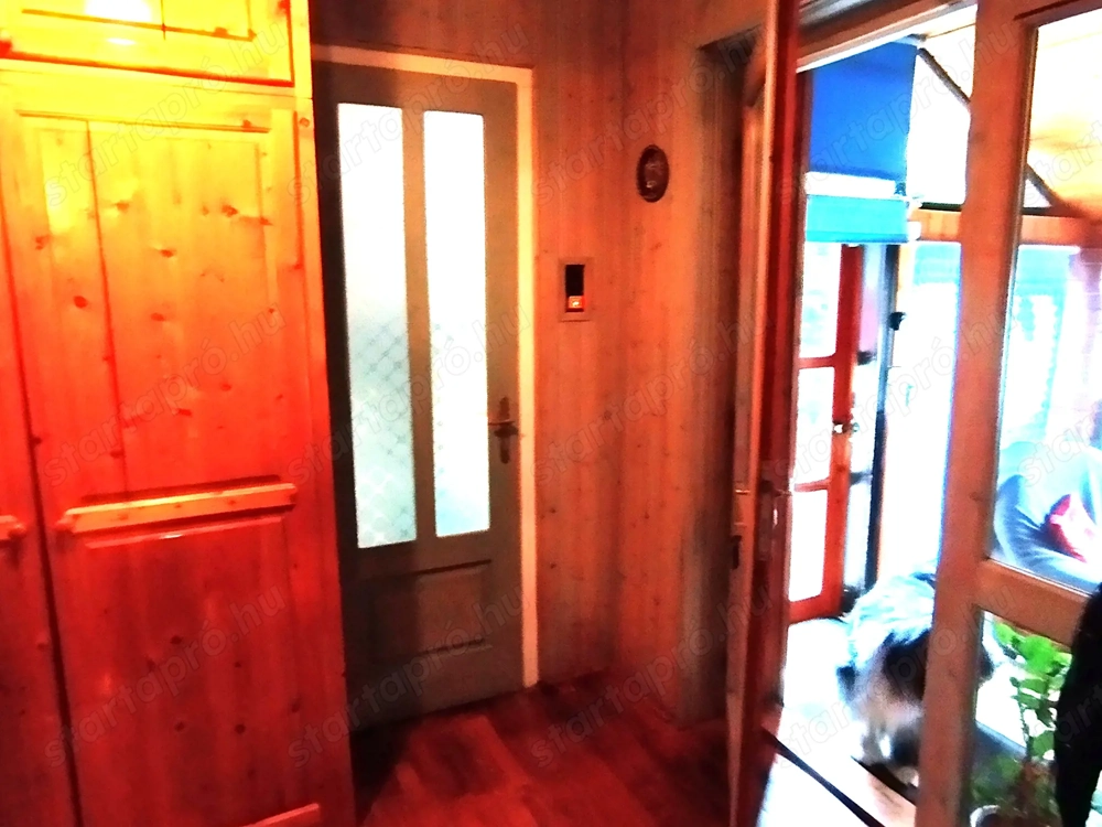 Ráchegyen jó állapotú téglaépítésű családi ház 500 m2-es telken