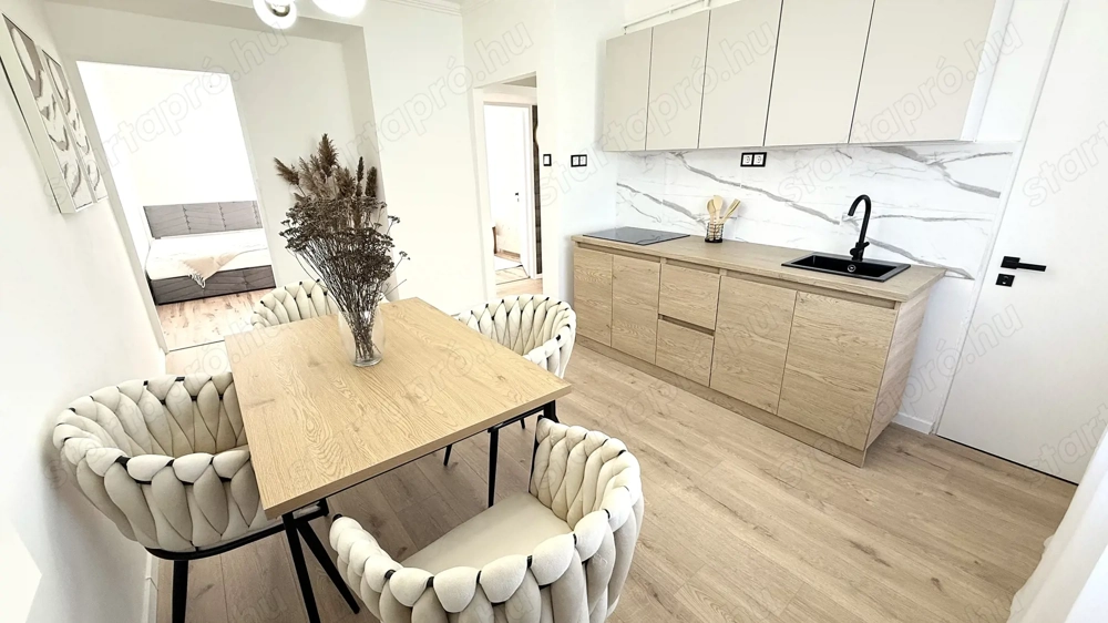 Malomkertben 59 nm-es 2 szoba-nappalis szigetelt erkélyes prémium tégla lakás garázzsal eladó