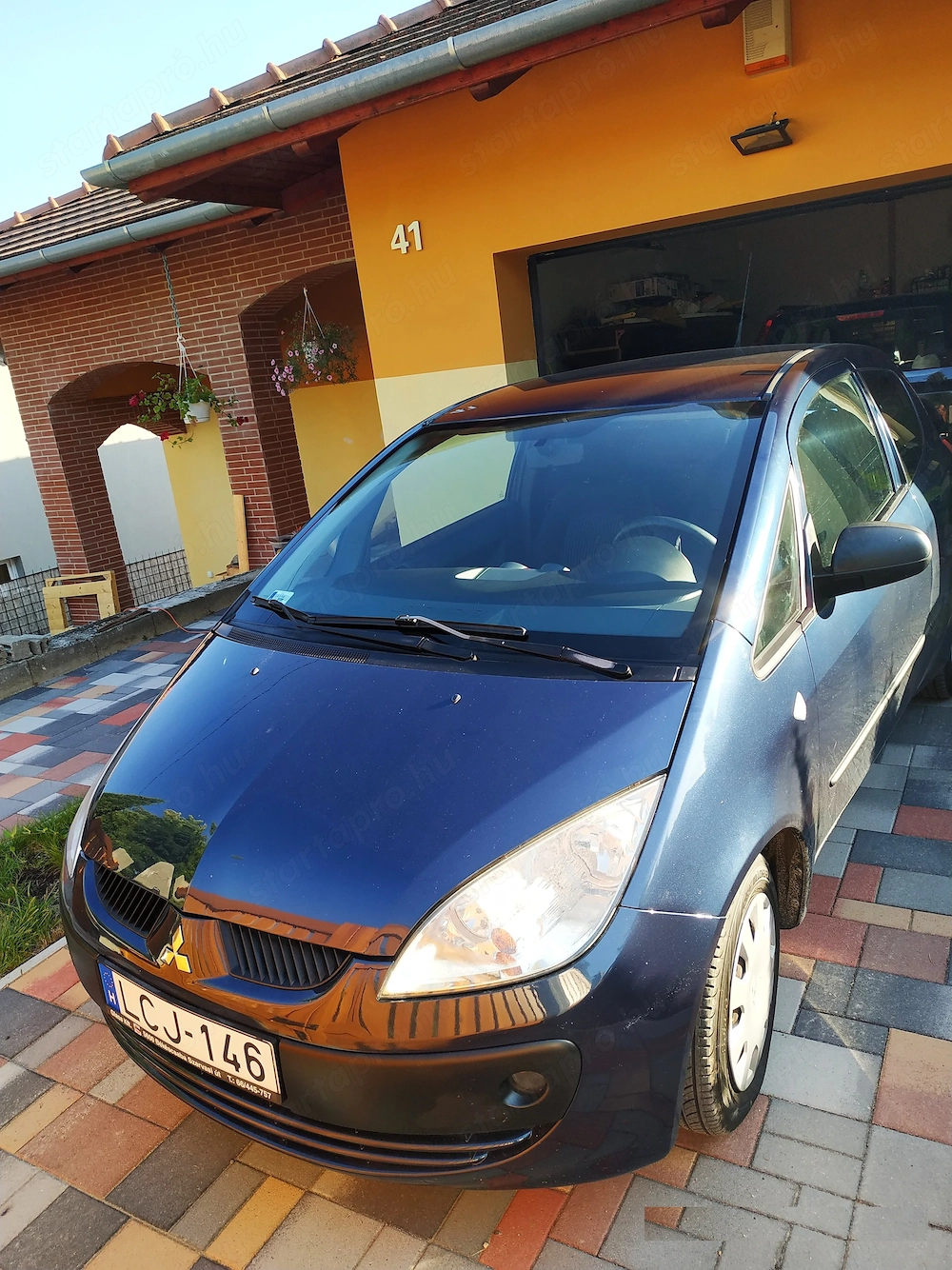 Sötétkék Mitsubishi Colt 1.1 Inform AC eladó