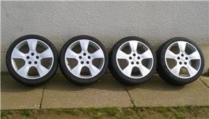 Eladó 4db 17-es 5x110-es Opel alufelni 215/40ZR17 Bridgestone-Firestone nyári gumival