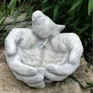 Madáritató - kéz madárral - kép 2