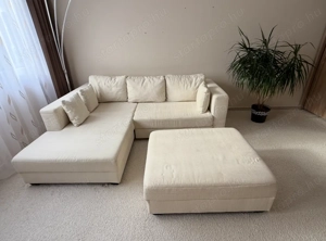 Ágynak nyitható bézs ülőgarnitúra puffal