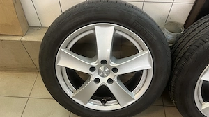 17x7j Dezent felni gumival