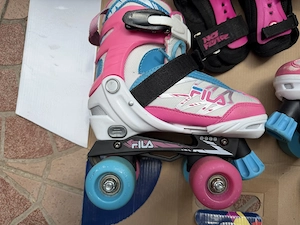31-34 állítható Fila Joy kétsoros görkorcsolya védőszettel jó állapotban 31-34 Fila Joy 10.000 Ft
