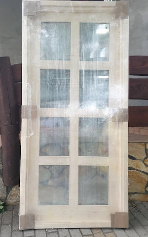 Vadonatúj bejárati ajtó,210x100cm olcsón eladó.