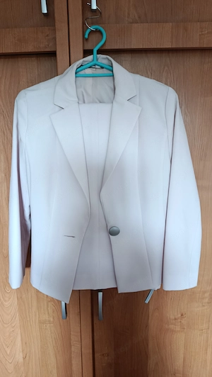Rózsaszín, elegáns, női nadrágkosztüm 38-as méretben eladó.